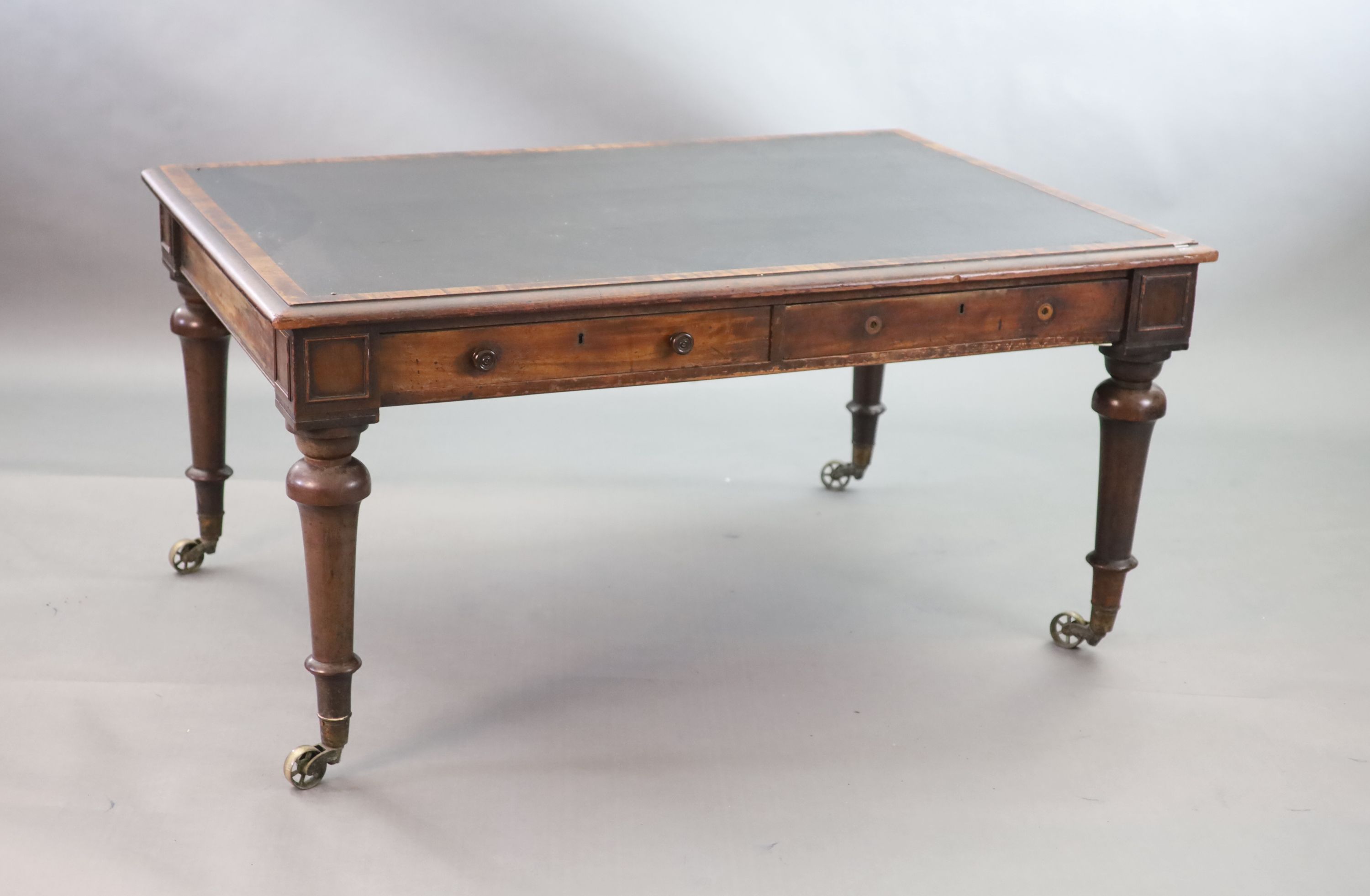 A Victorian mahogany library table, W.152cm D.105cm H.75cm